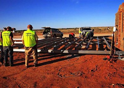 Cross members being placed over flooring bearers