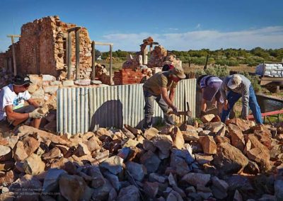 Sorting rocks ready for tepairing Moffatts house