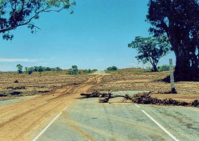 The road below Leigh Creek after flooding, the bitumen was intact, but the mud had flowed down the usually dry creek bed