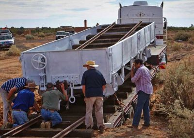 Assembling temporary fishplates ready for unloading the rail truck