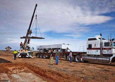 Unloading pre-fabricated rail sections