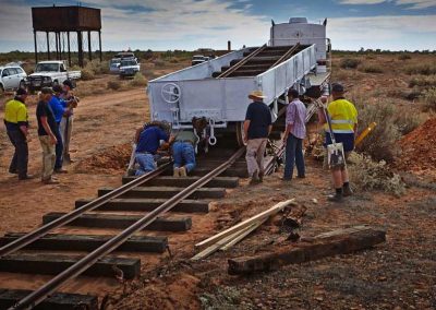 Getting ready to roll the rail waggon off the truck