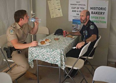 Local area supervisor and area officer enjoying a break