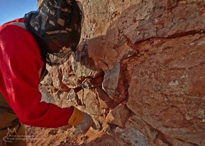 Readying the wall of the Polics Station store-room for re-pointing