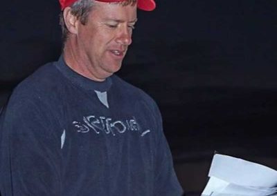 Pete announcing the silent auction results