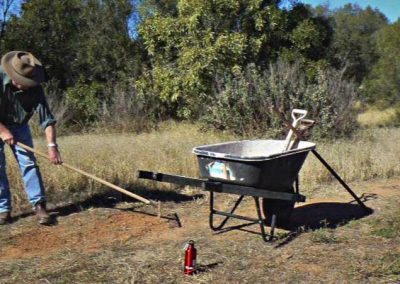Ken repairing a walking track.