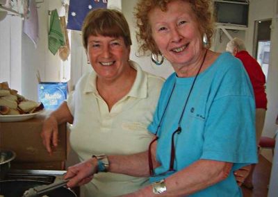 Bronwyn and Colynette preparing the dessert for first camp roast night.