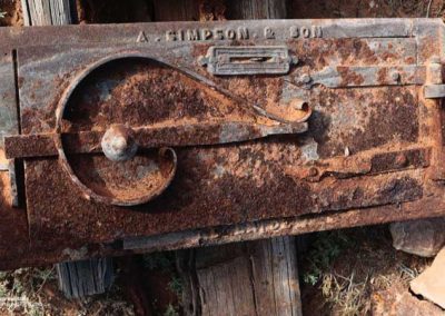 Oven door showing latching mechanism