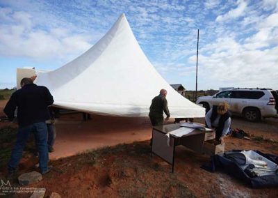 Vertical members are removed from the 4 corners of the marque.
