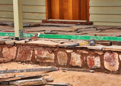 Applying slate over gambions