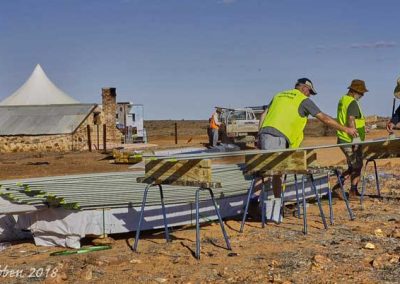 Pre-painting the exterior cladding timbers.