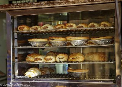Pies, pasties and sausage rolls in the warmer oven.
